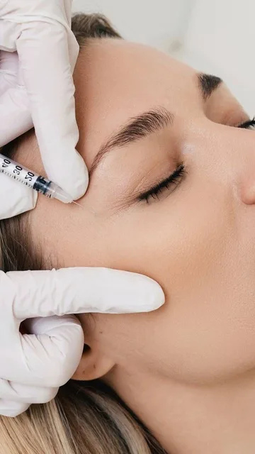 Doctor administering precise dermal filler treatment